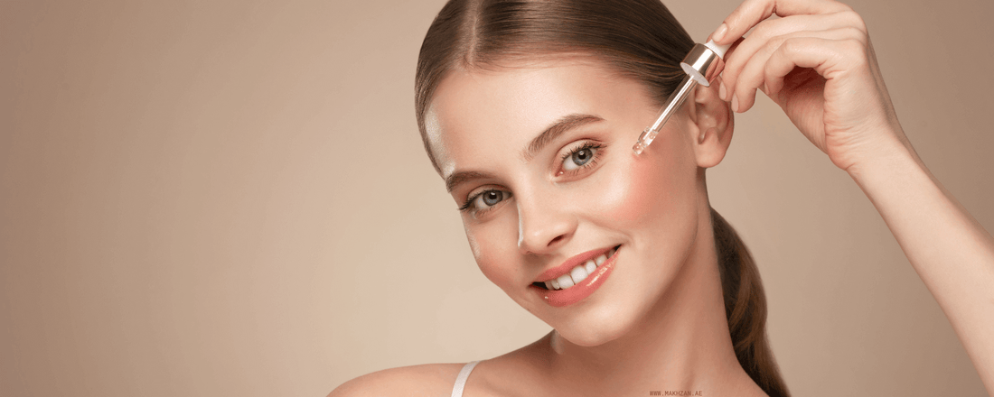 Model using serum showcasing differences between face serums and moisturizers