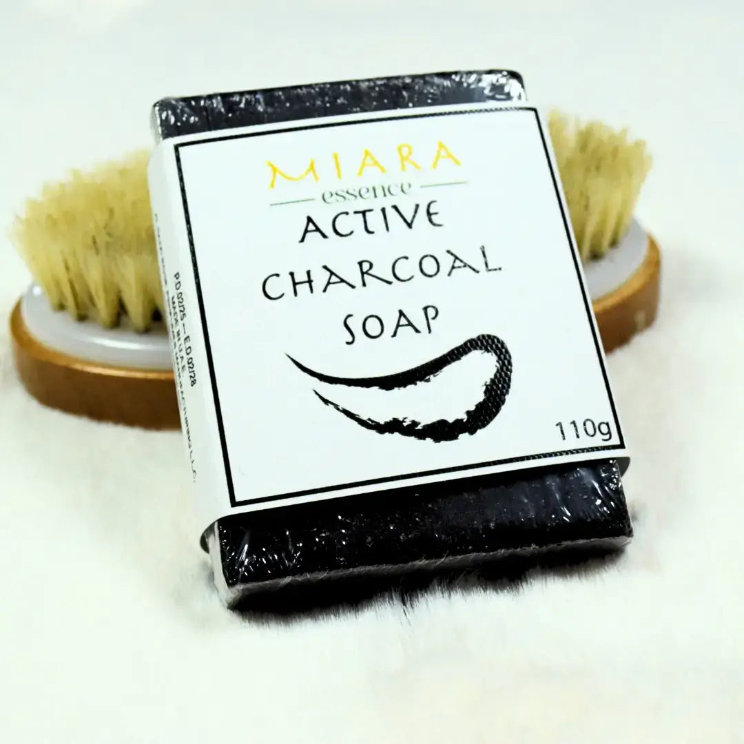 Miara Essence Activated Charcoal Soap packaged for detoxifying skin and cleaning pores.