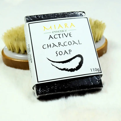 Miara Essence Activated Charcoal Soap packaged for detoxifying skin and cleaning pores.