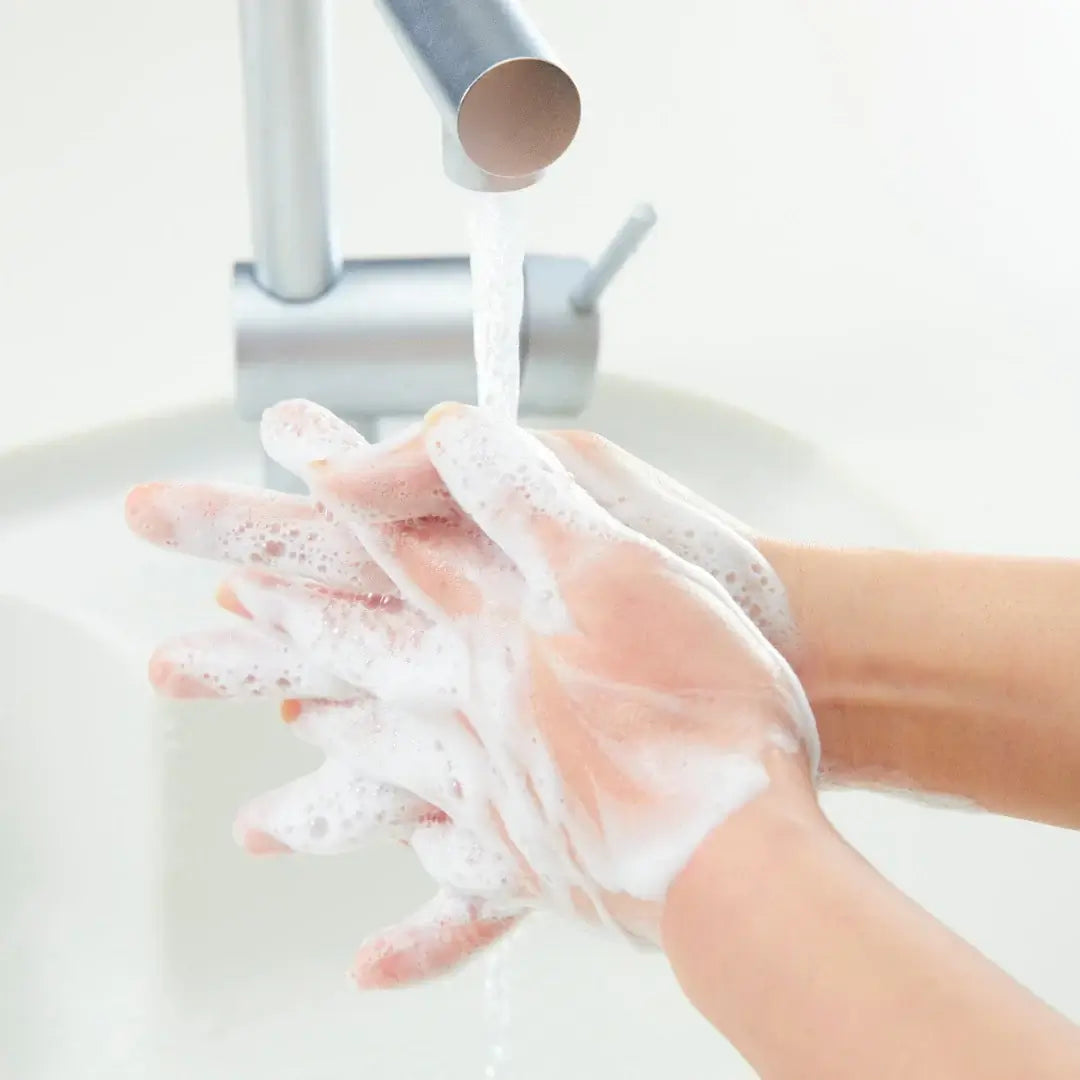 Person Using Miara Essence Curcuma Natural Soap 