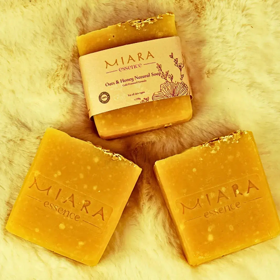 Miara Essence Oats & Honey Natural Soap bars on a soft background showcasing their natural ingredients.
