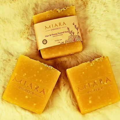 Miara Essence Oats & Honey Natural Soap bars on a soft background showcasing their natural ingredients.