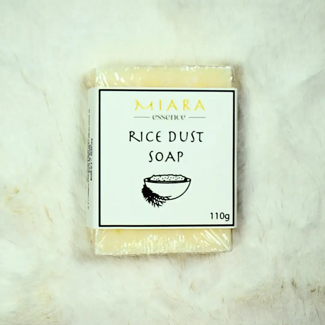 Miara Essence Rice Powder Soap bar packaged with rice dust label, 110g, for natural skin brightening and softening.