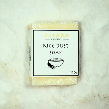 Miara Essence Rice Powder Soap bar packaged with rice dust label, 110g, for natural skin brightening and softening.
