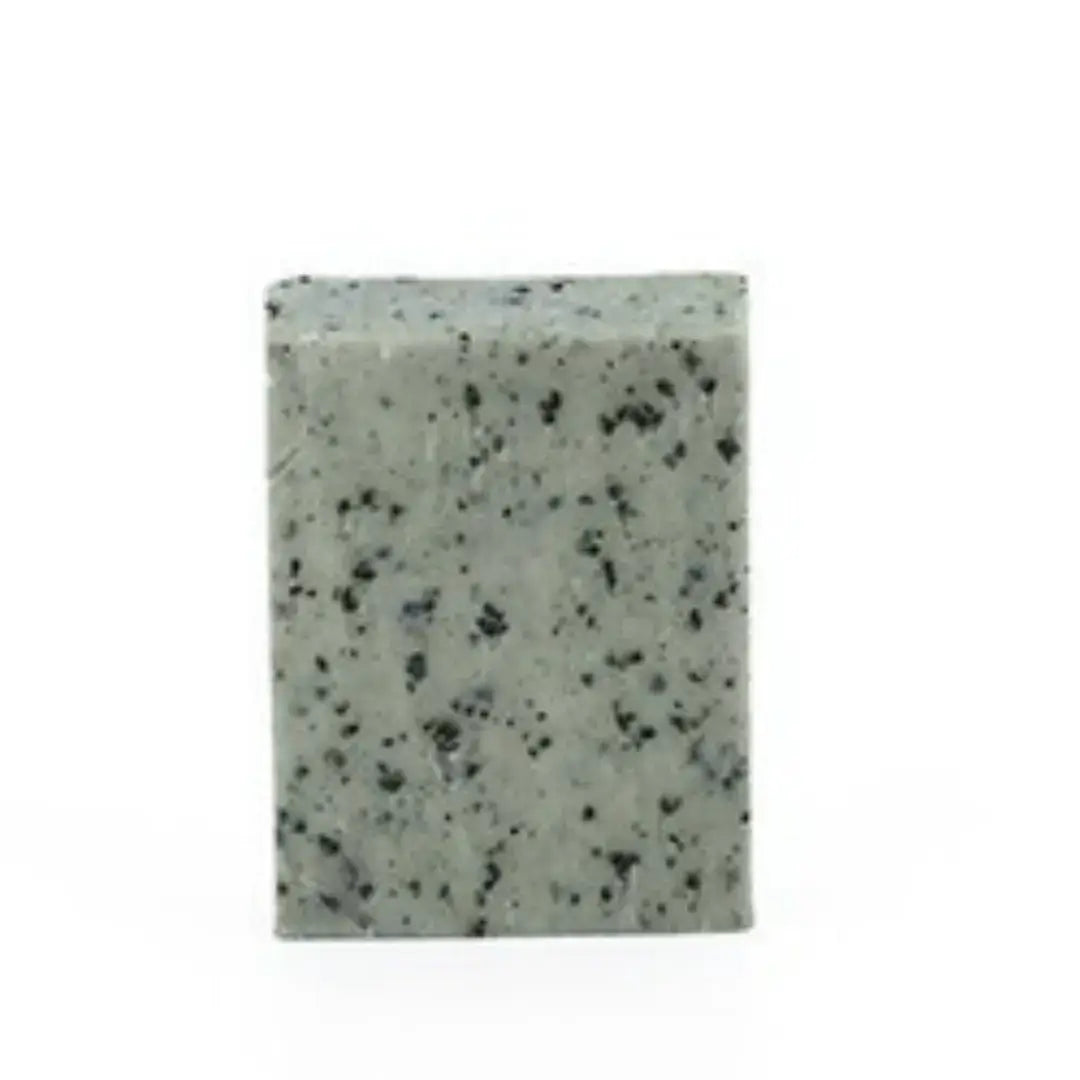 Black Seed Natural Soap | Miara Essence Black Seed Soap bar with a speckled gray-green appearance.